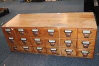 An 18 drawer pine unit