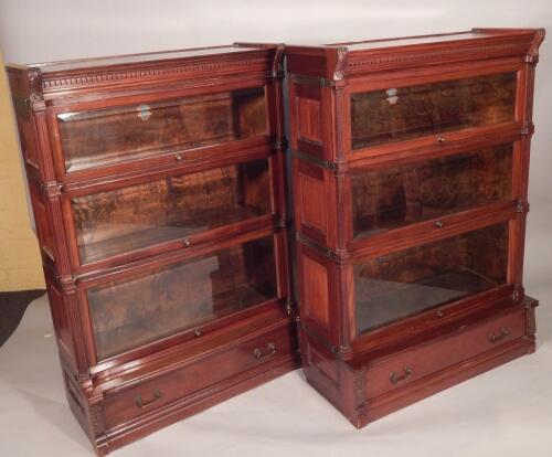 A pair of late 19th/early 20thC Globe Wernicke mahogany sectional bookcases