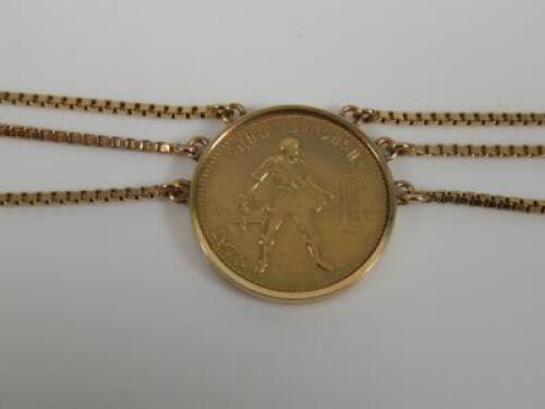 A coin pendant and chain