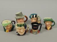 Six miniature character jugs