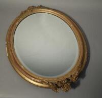 A late 19thC gilt oval wall mirror