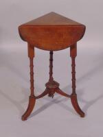 A Victorian walnut occasional table