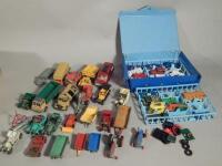 A large quantity of play worn die-cast vehicles