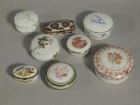 A collection of eight Limoges porcelain boxes and covers