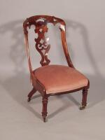 An early Victorian rosewood spoon back chair