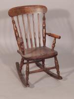 A 19thC child's Windsor rocking chair