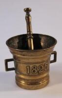 A 19thC brass pestle and mortar