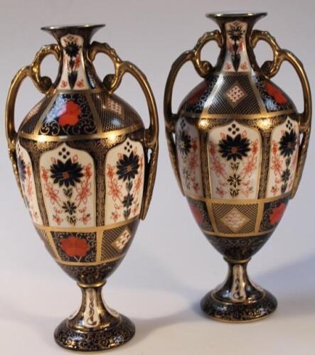 A pair of Royal Crown Derby Imari pattern vases