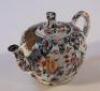 An 18thC tin glazed Delftware teapot