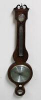 A George III flame mahogany wheel barometer