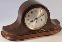 An Edwardian oak Napoleon hat mantel clock