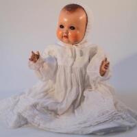 A mid-20thC 264K9 moulded composite doll