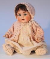 An early 20thC Armand Marseille bisque headed doll