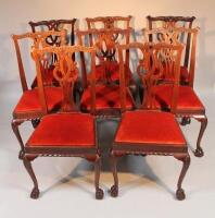 A set of eight Chippendale design ribbon back dining chairs