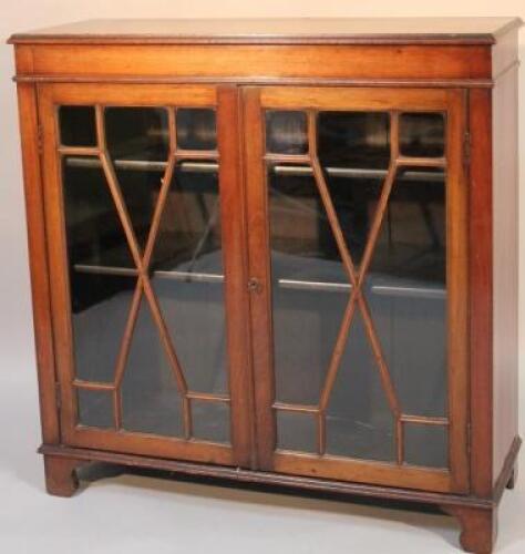A mahogany free standing bookcase