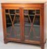 A mahogany free standing bookcase