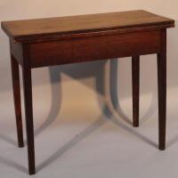 A George III oak fold over tea table