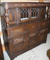 An Old Charm oak finish court cupboard