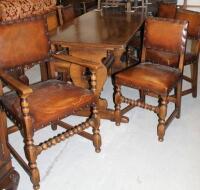 A Priory style dark oak refectory dining table