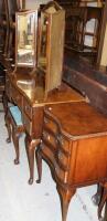 A mid-20thC walnut veneered bedroom suite