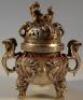 A Chinese silvered metal censer and cover