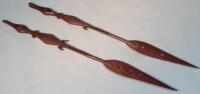 Two West African hardwood ceremonial paddle spears