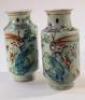 A pair of 19thC famille vert vases