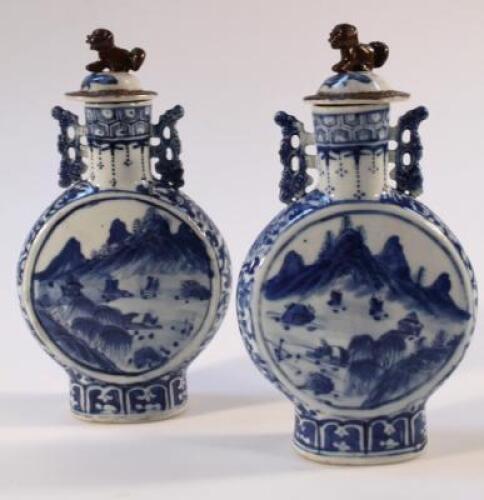 A pair of Chinese blue and white moon flasks