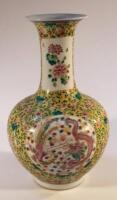 A Chinese Ming style famille jaune vase