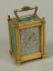 A Victorian gilt metal and malachite mounted carriage timepiece