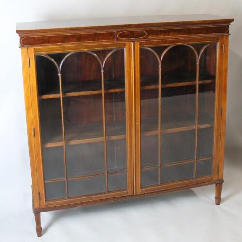 A mahogany Sheraton Revival bookcase