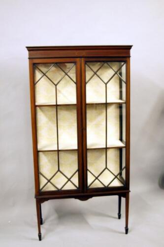 An Edwardian mahogany inlaid glazed display cabinet