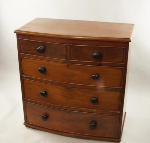 A Victorian bowfronted mahogany chest of drawers