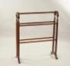 A Victorian mahogany towel rail