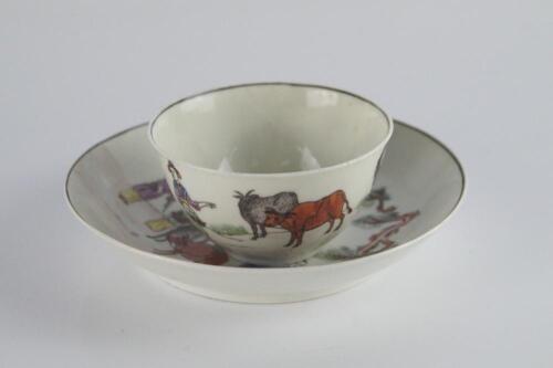 An 18thC porcelain tea bowl with saucer