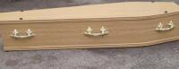 An oak effect coffin