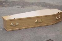 An oak effect coffin