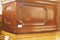 A stained oak panelled coffin