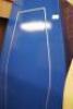 A blue panelled painted coffin