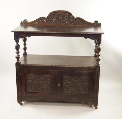 A Jacobean Revival oak buffet