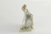 A Lladro figure of a lady