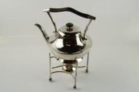 An Arts & Crafts electroplate spirit kettle