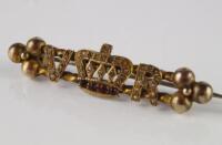 A bar brooch