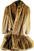 A mid 20thC long fur coat