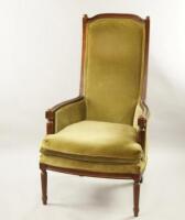 A Victorian style mahogany high backed armchair