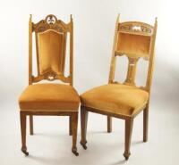 Two oak Arts and Crafts dining chairs