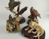 A collection of seven wildlife ornaments