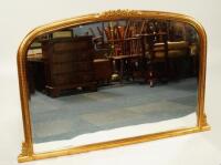 A modern gilt framed bevelled overmantel