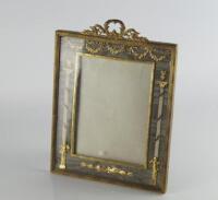 An Edwardian Neo Classical gilt picture frame