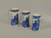 Three Burleighware graduated Willow pattern jugs.